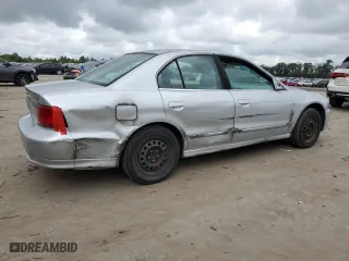 2002 Mitsubishi Galant ES with VIN 4A3AA46G42E117189, listed as a Copart auction lot 68738064 with 147,493 mi miles and Salvage Title. Bid and sale history available at carsss.com. Image 3.