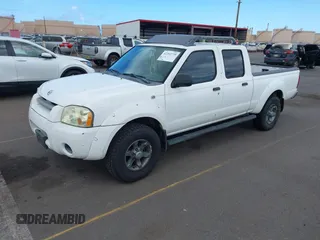 2004 Nissan Frontier XE z VIN 1N6ED29X54C475425, wystawiony jako IAAI lot #42292779 z przebiegiem 156 000 mil mil oraz . Historia ofert i sprzedaży dostępna na DreamBid. Obrazek 2.