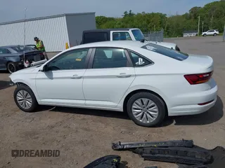 2019 Volkswagen Jetta S z VIN 3VWC57BU7KM243356, wystawiony jako IAAI lot #42334838 z przebiegiem 48 343 mil mil oraz . Historia ofert i sprzedaży dostępna na DreamBid. Obrazek 15.