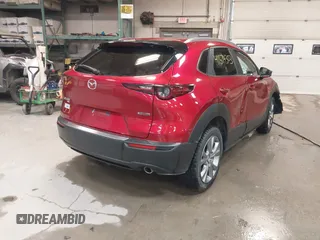 2024 Mazda CX-30 S Preferred with VIN 3MVDMBCM7RM685929, listed as a IAAI auction lot 41574303 with 7,928 mi miles and . Bid and sale history available at DreamBid. Image 4.