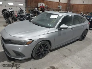2023 Honda Civic Hatchback Sport Touring with VIN 19XFL1H88PE014053, listed as a IAAI auction lot 41537621 with 21,451 mi miles. Bid and sale history available at carsss.com. Image 18.