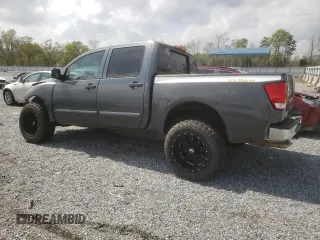 2010 Nissan Titan LE with VIN 1N6BA0EC1AN325055, listed as a Copart auction lot 51471785 with 137,110 mi miles and Salvage Title. Bid and sale history available at carsss.com. Image 2.