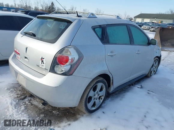 2009 Pontiac Vibe with VIN 5Y2SM67069Z453831, listed as a IAAI auction lot 41526347 with 163,468 mi miles. Bid and sale history available at carsss.com. Image 4.