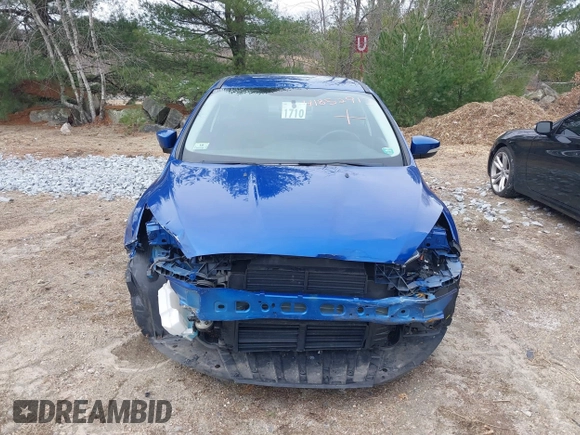 2018 Ford Focus SE z VIN 1FADP3F25JL255840, wystawiony jako IAAI lot #41852913 z przebiegiem 64 010 mil mil oraz . Historia ofert i sprzedaży dostępna na DreamBid. Obrazek 12.