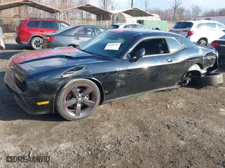 2013 Dodge Challenger SXT with VIN 2C3CDYAG5DH520017, listed as a IAAI auction lot 41882517 with 128,854 mi miles. Bid and sale history available at carsss.com. Image 17.