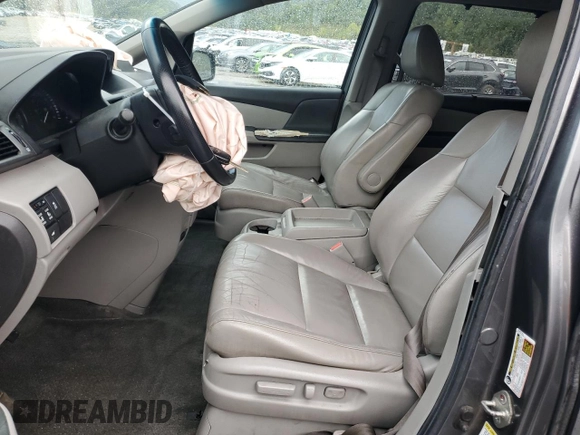 2012 Honda Odyssey EX-L with VIN 5FNRL5H64CB035196, listed as a Copart auction lot 71566704 with 243,529 mi miles and Salvage Title. Bid and sale history available at carsss.com. Image 7.