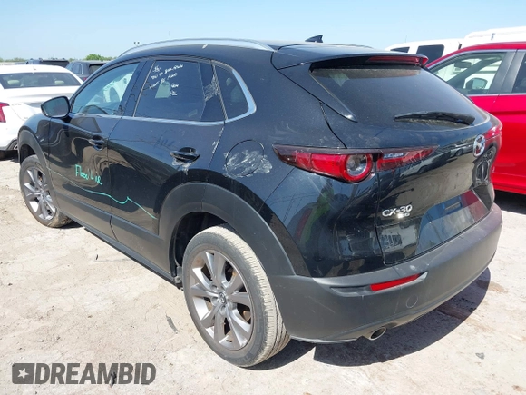 2024 Mazda CX-30 S Premium with VIN 3MVDMBDM4RM651543, listed as a IAAI auction lot 41993345 with 25,675 mi miles and . Bid and sale history available at DreamBid. Image 3.