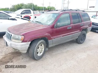 2003 Jeep Grand Cherokee Laredo with VIN 1J4GX48S83C576892, listed as a IAAI auction lot 42082865 with 212,157 mi miles. Bid and sale history available at carsss.com. Image 2.