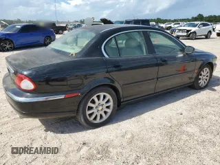 2003 Jaguar X-Type 2.5L Manual z VIN SAJEA51D73XD21289, wystawiony jako Copart lot #59583194 z przebiegiem 70 333 mil mil oraz Czysty tytuł • Clean title. Historia ofert i sprzedaży dostępna na DreamBid. Obrazek 3.