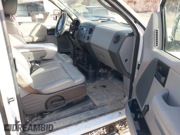 2005 Ford F-150 STX with VIN 1FTRX14W15NB34372, listed as a IAAI auction lot 41660412 with 104,086 mi miles. Bid and sale history available at carsss.com. Image 5.