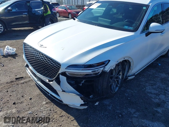 2022 Genesis GV70 2.5T with VIN KMUMADTB5NU051297, listed as a IAAI auction lot 41892642 with 46,421 mi miles and . Bid and sale history available at DreamBid. Image 6.