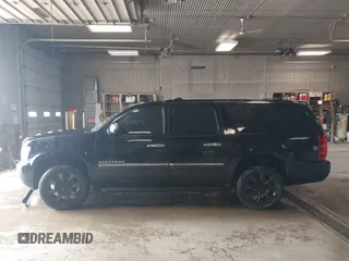 2010 Chevrolet Suburban LTZ with VIN 1GNUKKE39AR106851, listed as a IAAI auction lot 41994155 with 148,776 mi miles. Bid and sale history available at carsss.com. Image 14.