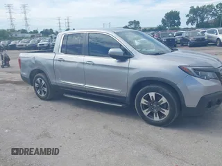 2017 Honda Ridgeline RTL with VIN 5FPYK2F51HB001500, listed as a IAAI auction lot 42557449 with 104,533 mi miles and . Bid and sale history available at DreamBid. Image 1.
