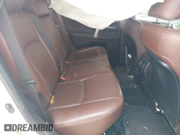 2014 Toyota 4Runner SR5 with VIN JTEZU5JR7E5080554, listed as a IAAI auction lot 42134833 with 170,077 mi miles and . Bid and sale history available at DreamBid. Image 8.