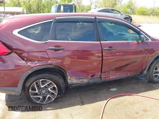 2016 Honda CR-V SE with VIN 2HKRM4H42GH715661, listed as a IAAI auction lot 42077889 with 77,402 mi miles and . Bid and sale history available at carsss.com. Image 6.