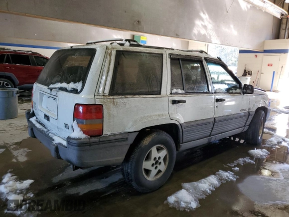 1993 Jeep Grand Cherokee Laredo with VIN 1J4GZ58Y2PC658787, listed as a Copart auction lot 41687765 with 166,262 mi miles and Salvage Title. Bid and sale history available at carsss.com. Image 3.