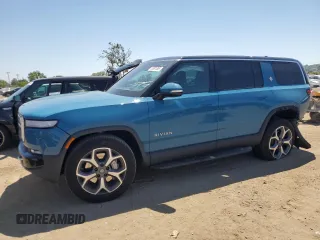 2024 Rivian R1S Adventure z VIN 7PDSGBBA0RN034793, wystawiony jako Copart lot #55091885 z przebiegiem 20 154 mil mil oraz Szkody całkowita. Historia ofert i sprzedaży dostępna na DreamBid. Obrazek 1.