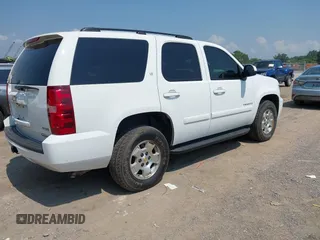 2008 Chevrolet Tahoe LTZ with VIN 1GNFK13008J156624, listed as a IAAI auction lot 42573117 with 185,116 mi miles and . Bid and sale history available at DreamBid. Image 4.