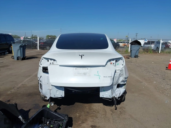 2022 Tesla Model Y Long Range with VIN 7SAYGDEE1NF364241, listed as a IAAI auction lot 42190272 with 54,878 mi miles and . Bid and sale history available at DreamBid. Image 16.