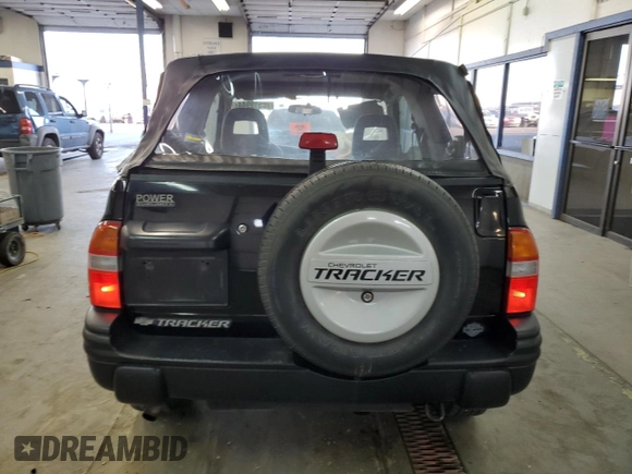 2002 Chevrolet Tracker with VIN 2CNBJ18CX26906088, listed as a Copart auction lot 79519944 with 111,342 mi miles and Salvage title. Bid and sale history available at DreamBid. Image 6.
