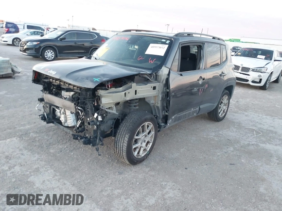 2021 Jeep Renegade Latitude with VIN ZACNJDBB0MPN13884, listed as a IAAI auction lot 40957052 with 52,023 mi miles. Bid and sale history available at carsss.com. Image 2.