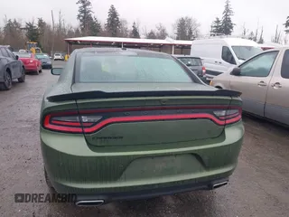 2021 Dodge Charger SXT with VIN 2C3CDXBG7MH681655, listed as a IAAI auction lot 41689007 with 66,036 mi miles and . Bid and sale history available at DreamBid. Image 16.