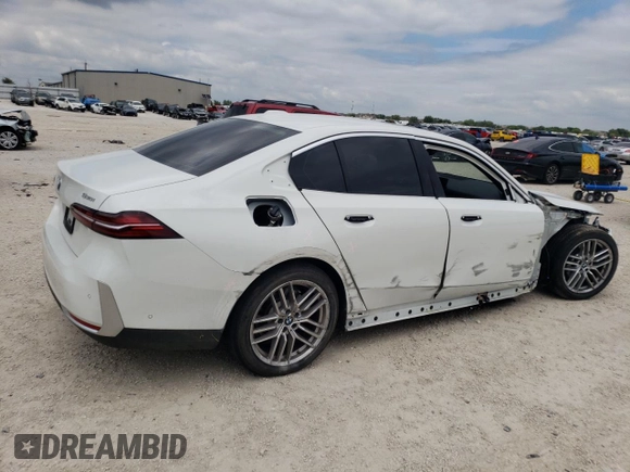 2024 BMW 5 Series 530i with VIN WBA43FJ03RCR61887, listed as a Copart auction lot 69975144 with 2,737 mi miles and Salvage Title. Bid and sale history available at carsss.com. Image 3.