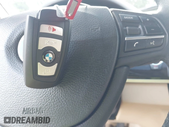 2014 BMW 5 Series 535i with VIN WBA5B1C51ED481967, listed as a IAAI auction lot 42410970 with 90,012 mi miles and . Bid and sale history available at DreamBid. Image 11.