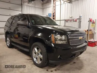 2008 Chevrolet Tahoe 1LT with VIN 1GNFK130X8J157425, listed as a IAAI auction lot 41695558 with 165,140 mi miles and . Bid and sale history available at DreamBid. Image 1.