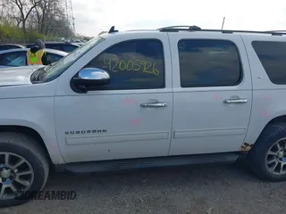 2013 Chevrolet Suburban LT with VIN 1GNSKJE79DR328718, listed as a IAAI auction lot 42005926 with 168,610 mi miles and . Bid and sale history available at DreamBid. Image 15.