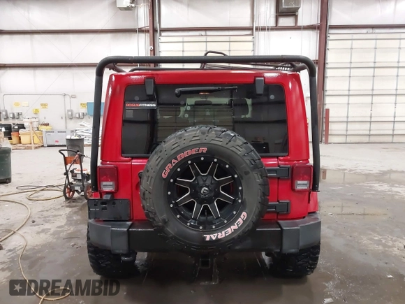 2011 Jeep Wrangler Sahara with VIN 1J4AA5D10BL593534, listed as a IAAI auction lot 41551416 with 101,716 mi miles and . Bid and sale history available at DreamBid. Image 16.