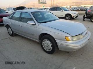1995 Ford Taurus GL with VIN 1FALP52U5SA320424, listed as a Copart auction lot 83676194 with 177,817 mi miles and Salvage title. Bid and sale history available at DreamBid. Image 4.