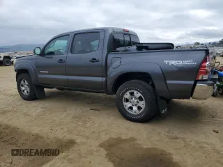 2013 Toyota Tacoma with VIN 3TMLU4EN5DM104791, listed as a Copart auction lot 43207965 with 121,427 mi miles and Salvage Title. Bid and sale history available at DreamBid. Image 2.