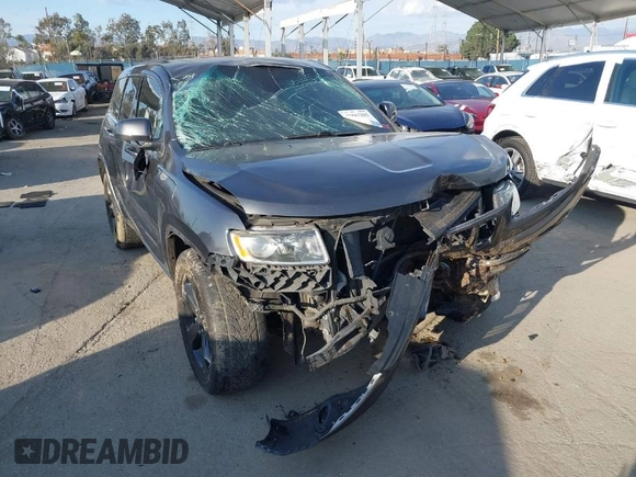 2014 Jeep Grand Cherokee Laredo with VIN 1C4RJEAG8EC529103, listed as a IAAI auction lot 41567193 with 163,944 mi miles. Bid and sale history available at carsss.com. Image 1.