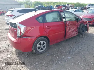2015 Toyota Prius Four with VIN JTDKN3DU2F1899150, listed as a IAAI auction lot 42143825 with 199,405 mi miles and . Bid and sale history available at DreamBid. Image 4.
