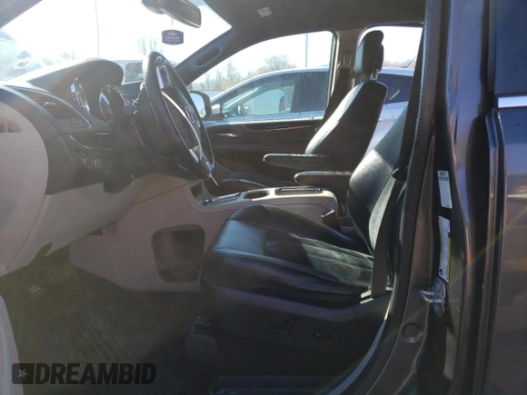 2018 Dodge Grand Caravan SXT with VIN 2C4RDGCGXJR325632, listed as a Copart auction lot 46326655 with 128,692 mi miles and Clean Title. Bid and sale history available at DreamBid. Image 7.