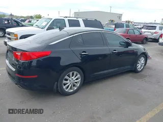2014 Kia Optima EX with VIN 5XXGN4A7XEG300394, listed as a IAAI auction lot 42117331 with 139,986 mi miles and . Bid and sale history available at carsss.com. Image 4.