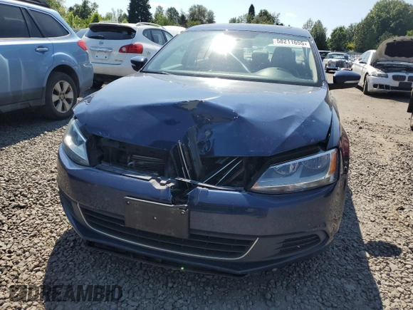 2014 Volkswagen Jetta SE with VIN 3VWD17AJ9EM323625, listed as a Copart auction lot 58211655 with 108,099 mi miles and Salvage title. Bid and sale history available at DreamBid. Image 5.