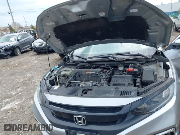 2020 Honda Civic LX with VIN 2HGFC2F65LH544133, listed as a IAAI auction lot 42148441 with 49,063 mi miles and . Bid and sale history available at DreamBid. Image 10.