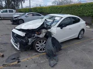 2017 Mazda Mazda3 4-Door Touring with VIN 3MZBN1V76HM121935, listed as a IAAI auction lot 41831505 with 121,631 mi miles. Bid and sale history available at carsss.com. Image 2.