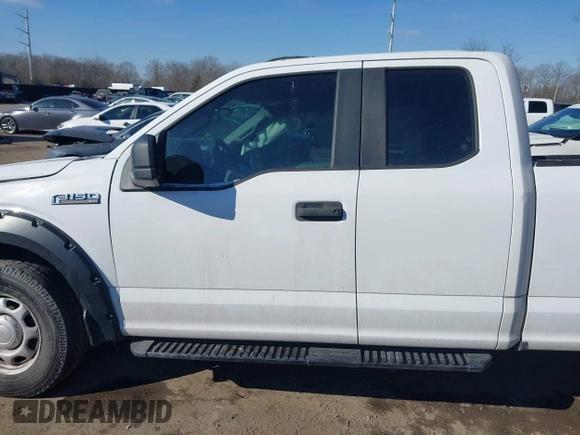 2017 Ford F-150 XL with VIN 1FTEX1E84HFB03694, listed as a IAAI auction lot 41388809 with 217,498 mi miles. Bid and sale history available at carsss.com. Image 14.