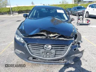 2018 Mazda 3 Sport with VIN 3MZBN1K76JM197424, listed as a IAAI auction lot 41950179 with 150,962 mi miles and . Bid and sale history available at DreamBid. Image 12.