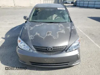 2004 Toyota Camry LE z VIN 4T1BE32K34U881717, wystawiony jako Copart lot #53731565 z przebiegiem Nie podano mil oraz Szkoda całkowita • Salvage title. Historia ofert i sprzedaży dostępna na DreamBid. Obrazek 5.