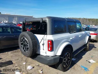 2023 Ford Bronco with VIN 1FMEE5DP0PLC16138, listed as a IAAI auction lot 41310455 with 25,963 mi miles. Bid and sale history available at carsss.com. Image 4.
