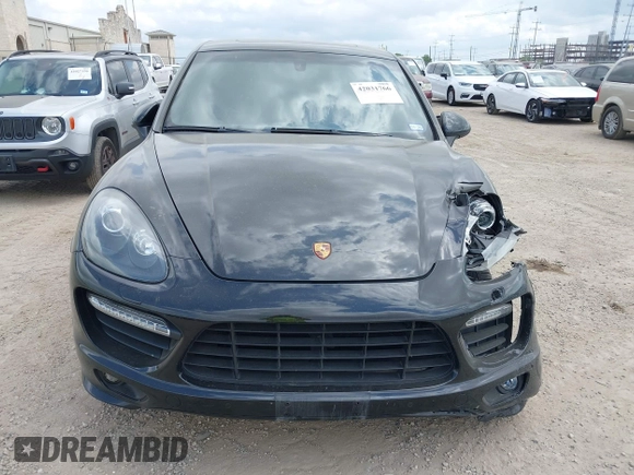 2014 Porsche Cayenne GTS with VIN WP1AD2A25ELA71350, listed as a IAAI auction lot 42031766 with 104,184 mi miles and . Bid and sale history available at DreamBid. Image 12.