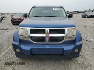 2009 Dodge Nitro SE with VIN 1D8GT28KX9W533248, listed as a Copart auction lot 70500994 with 124,091 mi miles and Salvage Title. Bid and sale history available at DreamBid. Image 5.