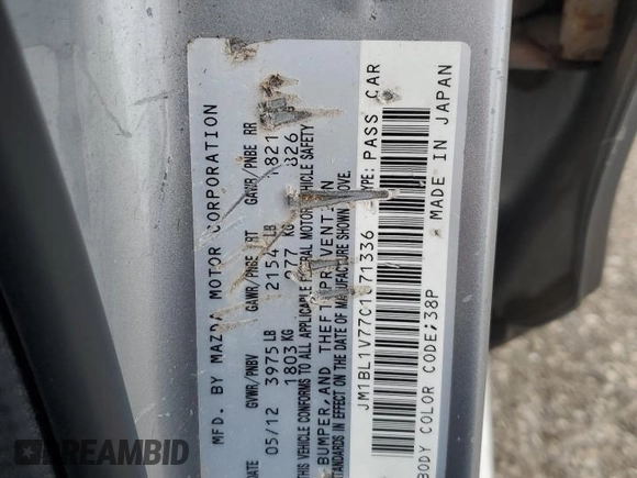 2012 Mazda 3 i Touring z VIN JM1BL1V77C1671336, wystawiony jako Copart lot #56644105 z przebiegiem 166 382 mil mil oraz Szkoda całkowita • Salvage title. Historia ofert i sprzedaży dostępna na DreamBid. Obrazek 12.