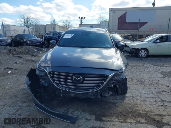 2019 Mazda CX-9 Signature with VIN JM3TCBEYXK0324257, listed as a IAAI auction lot 41986590 with Not provided miles and . Bid and sale history available at DreamBid. Image 12.
