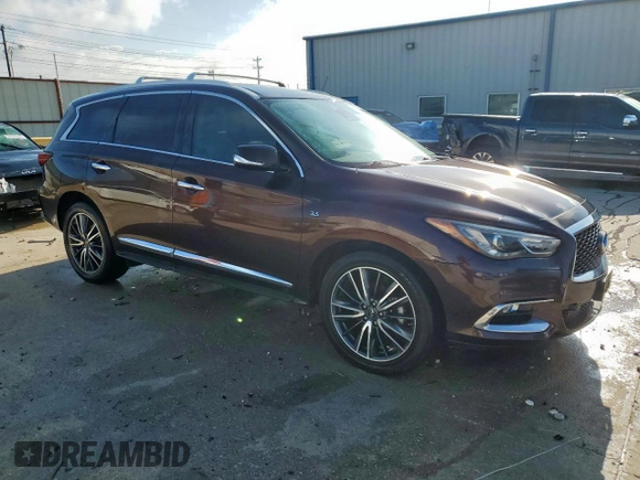 2019 Infiniti QX60 Pure with VIN 5N1DL0MN0KC504592, listed as a Copart auction lot 57896385 with 99,185 mi miles and Salvage title. Bid and sale history available at DreamBid. Image 4.
