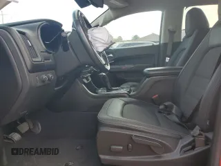 2021 GMC Canyon 4WD AT4 w/Leather with VIN 1GTG6FEN2M1224875, listed as a Copart auction lot 45553885 with 81,495 mi miles and Salvage Title. Bid and sale history available at carsss.com. Image 7.